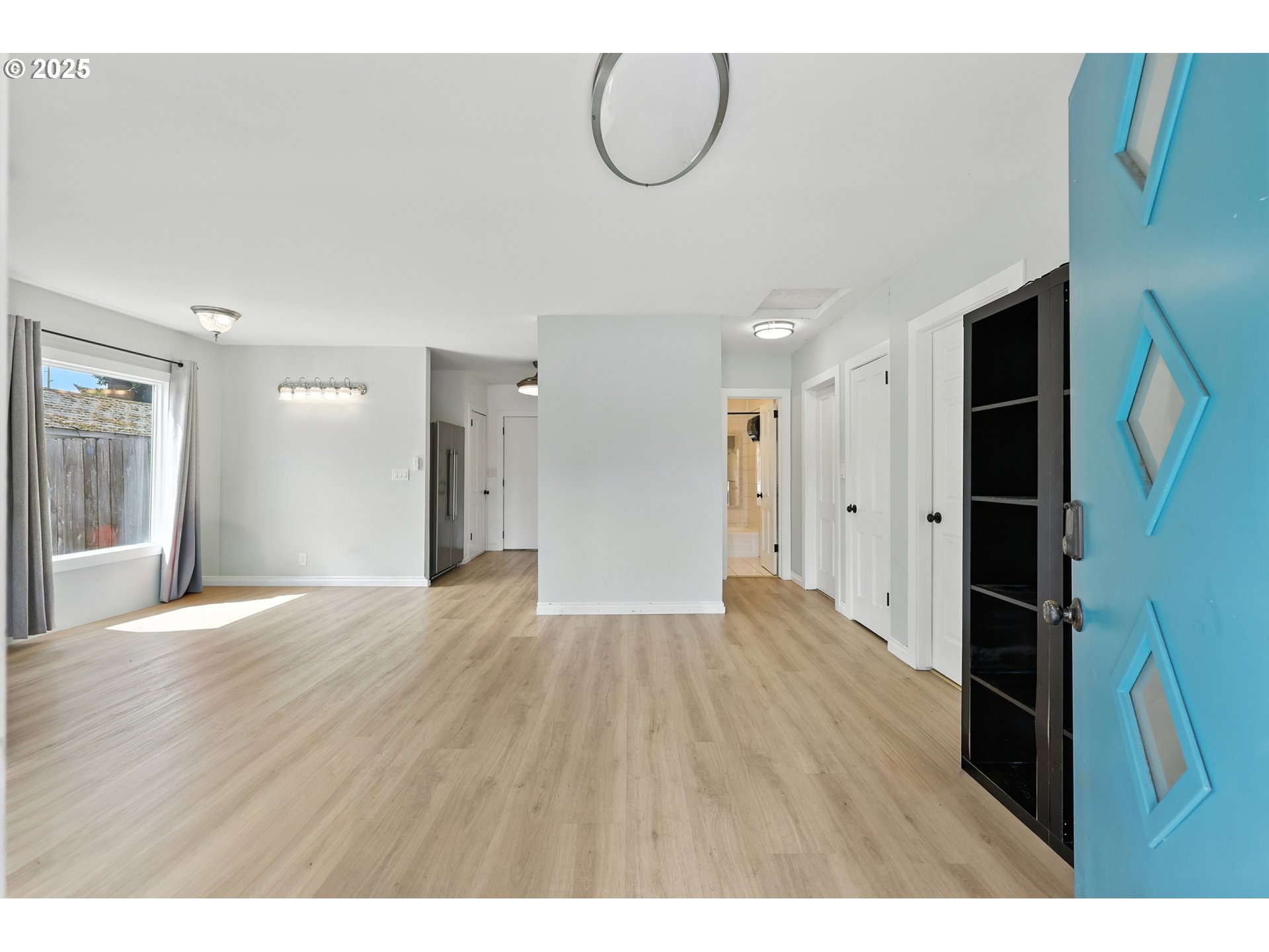 1611 Northeast 102nd Avenue Portland, OR 97220 - Photo 7 of 30 a view of empty room with wooden floor