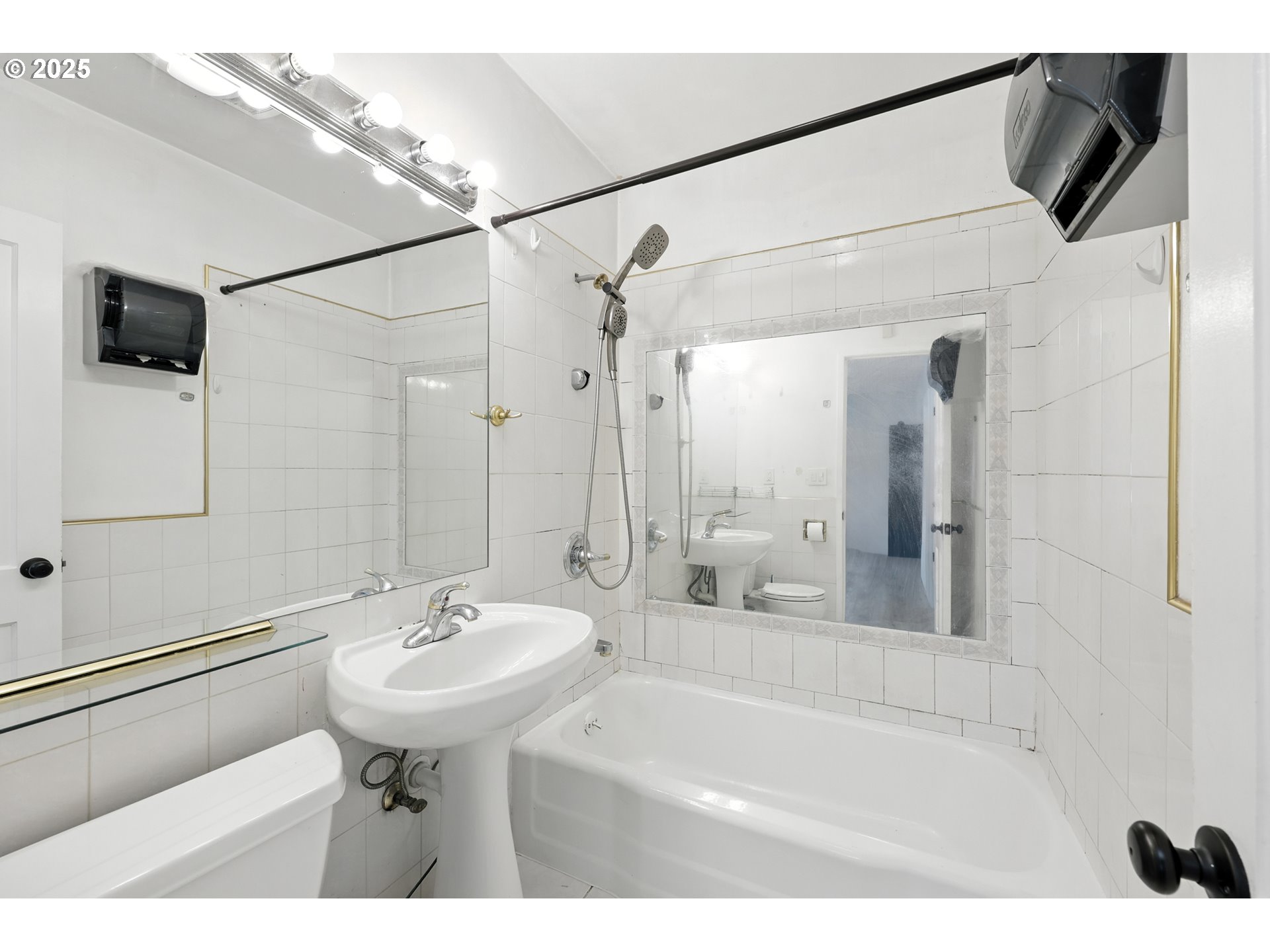 1611 Northeast 102nd Avenue Portland, OR 97220 - Photo 10 of 30 a bathroom with a sink a shower and a mirror