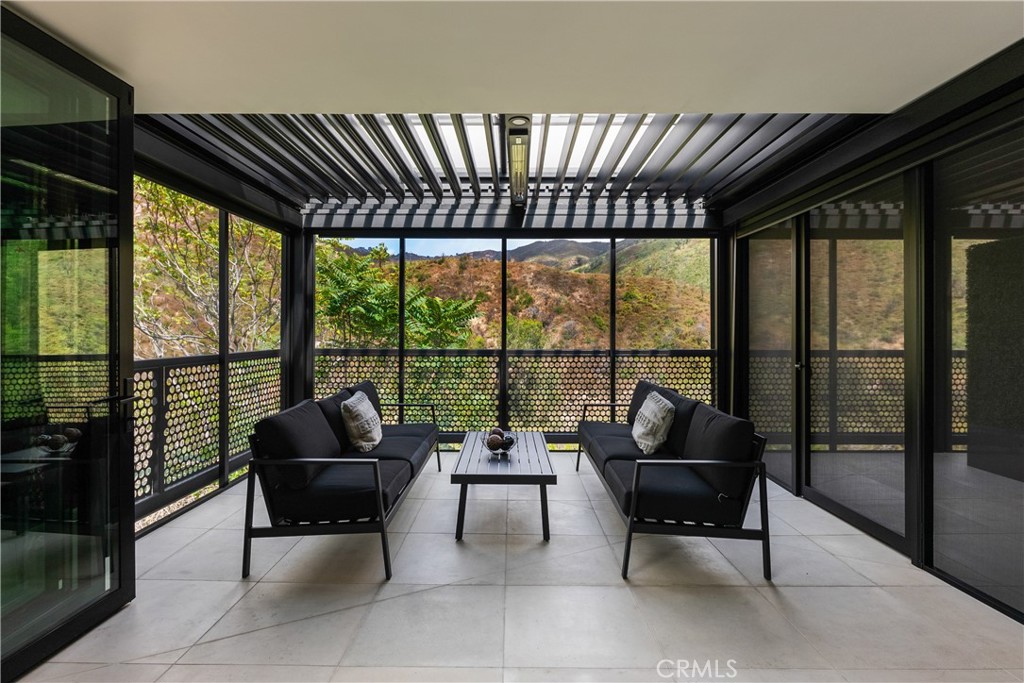 21656 Las Flores Heights Road Malibu, CA 90265 - Photo 30 of 71 patio that opens off of primary