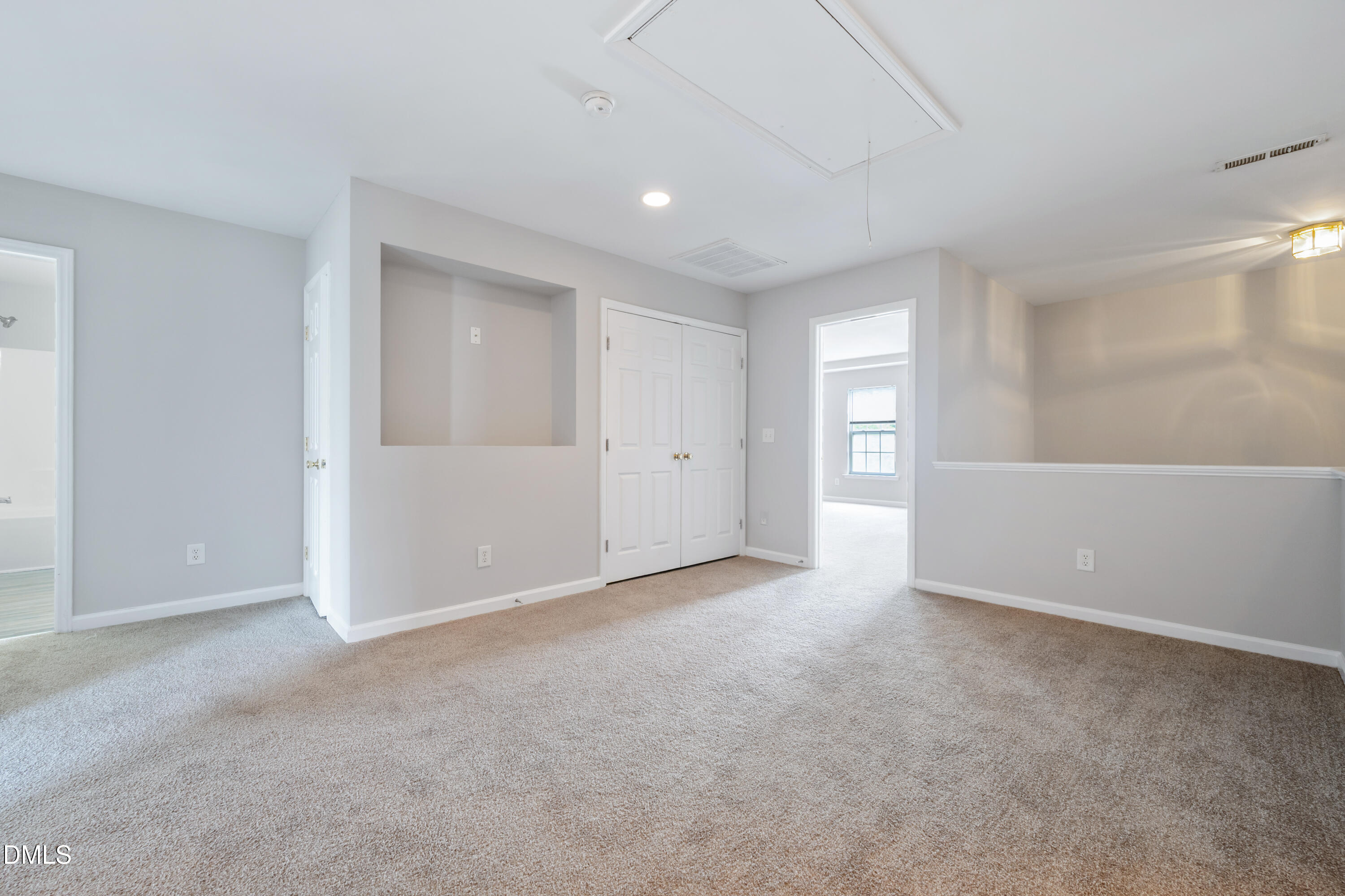1532 Pebble Ridge Drive Raleigh, NC 27610 - Photo 24 of 40 a view of an empty room with a window