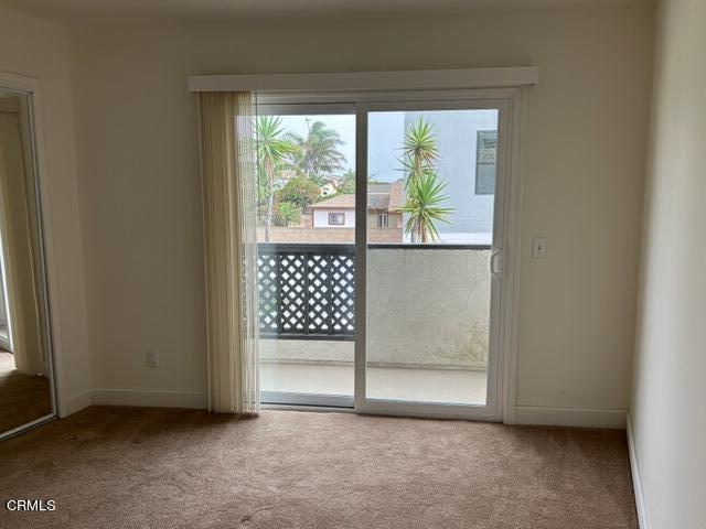 4907 Dunes Street, Unit 7 Oxnard, CA 93035 - Photo 24 of 74 an empty room with wooden floor and a window