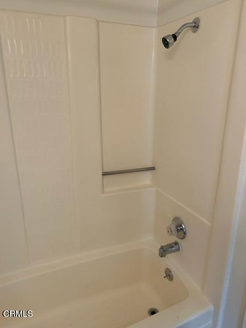 4907 Dunes Street, Unit 7 Oxnard, CA 93035 - Photo 35 of 74 a bathroom with a bathtub