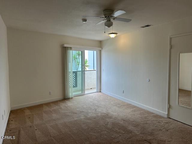 4907 Dunes Street, Unit 7 Oxnard, CA 93035 - Photo 45 of 74 an empty room with a empty space and windows