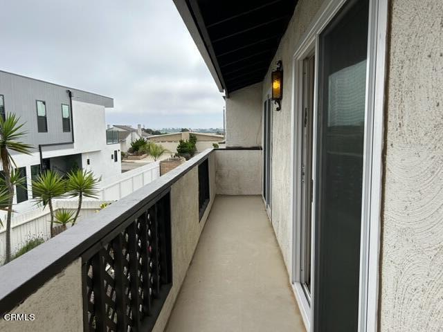 4907 Dunes Street, Unit 7 Oxnard, CA 93035 - Photo 48 of 74 a bathroom with a double vanity sink and a large mirror