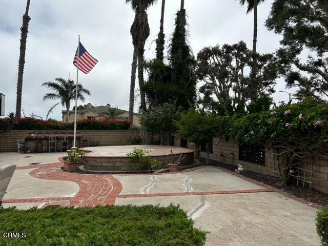 4907 Dunes Street, Unit 7 Oxnard, CA 93035 - Photo 54 of 74 a backyard of a house with lots of green space