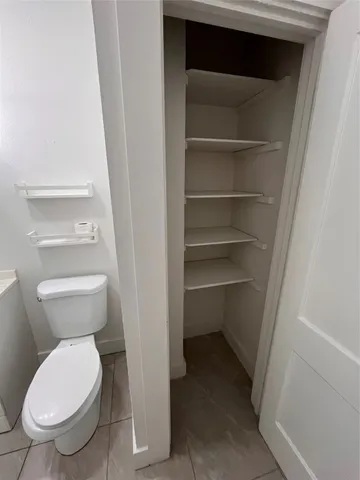 a bathroom with a toilet
