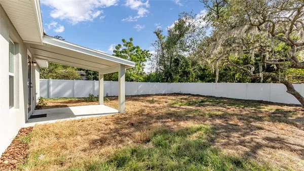 a house with trees in front of it