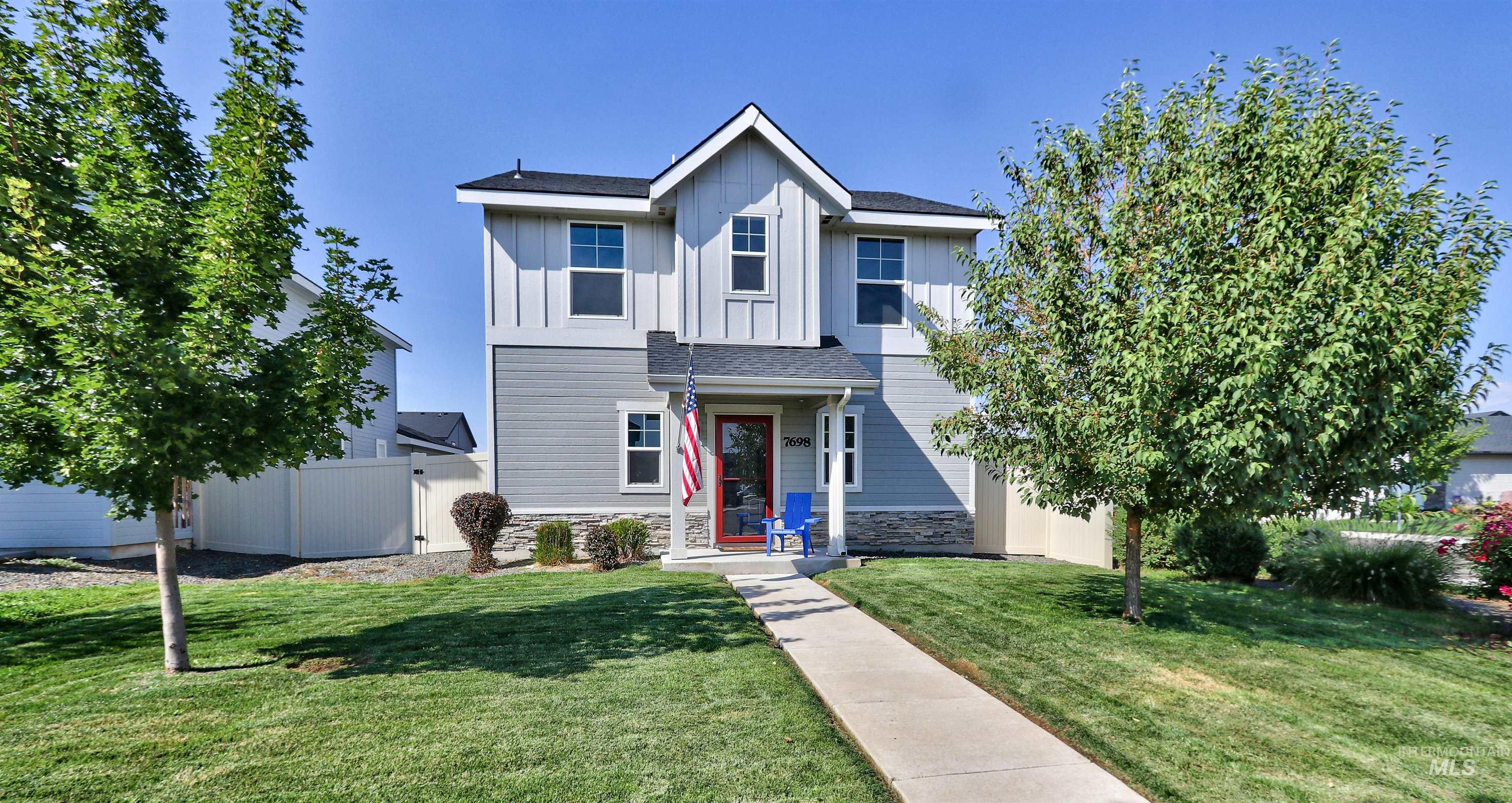 7698 South Seabreeze Way Boise, ID 83709 - Photo 2 of 16 View of front facade featuring a gate, board and batten siding, and roof with shingles