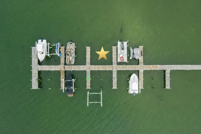 a view of a two chairs in a park