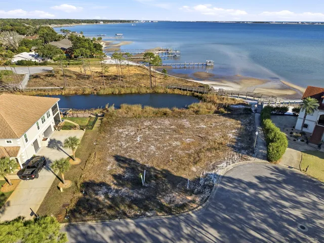 a view of a swimming pool with an ocean view