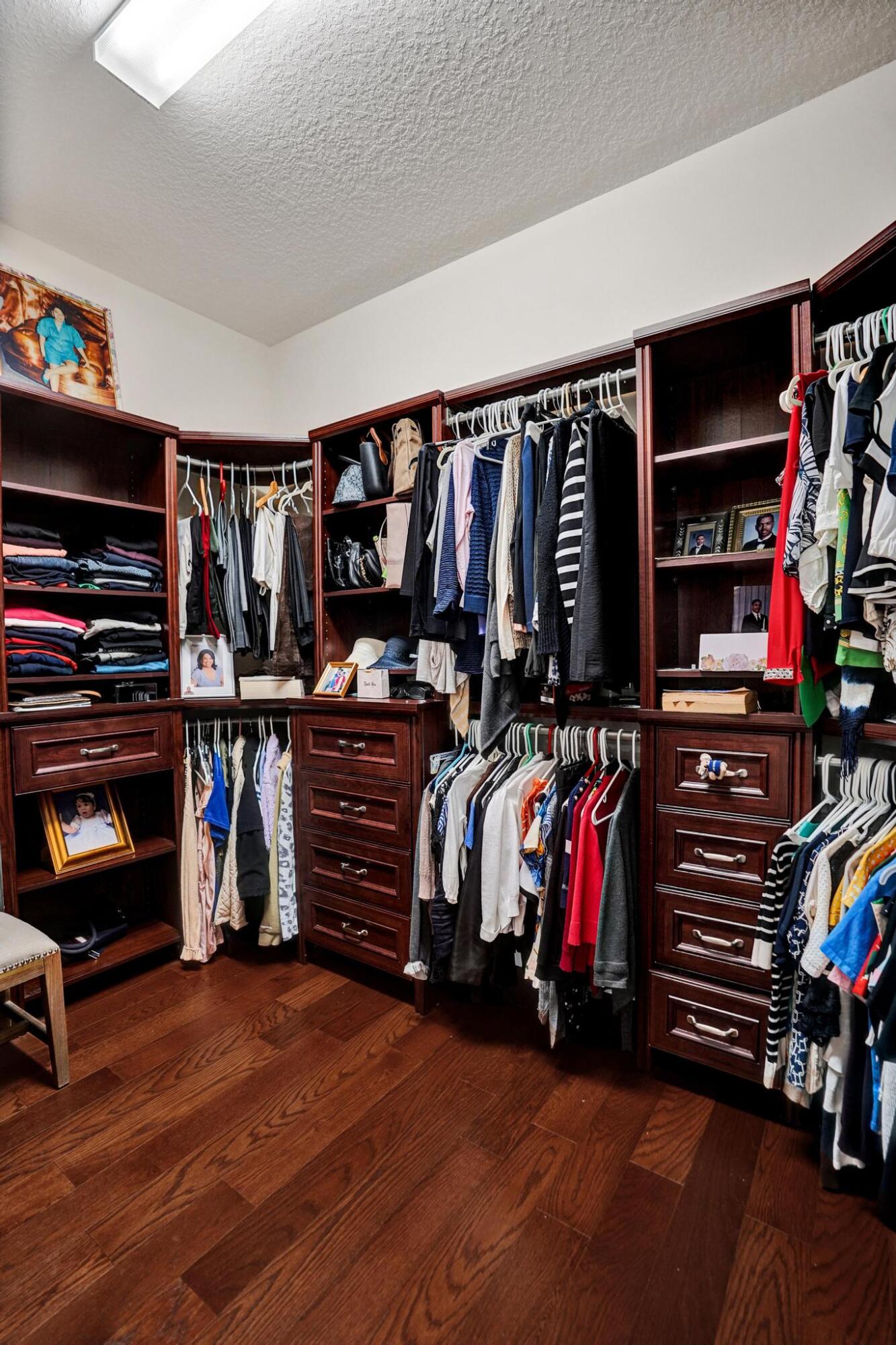 16610 Gateway Bridge Drive Delray Beach, FL 33446 - Photo 14 of 67 a view of walk in closet with clothes and shoes