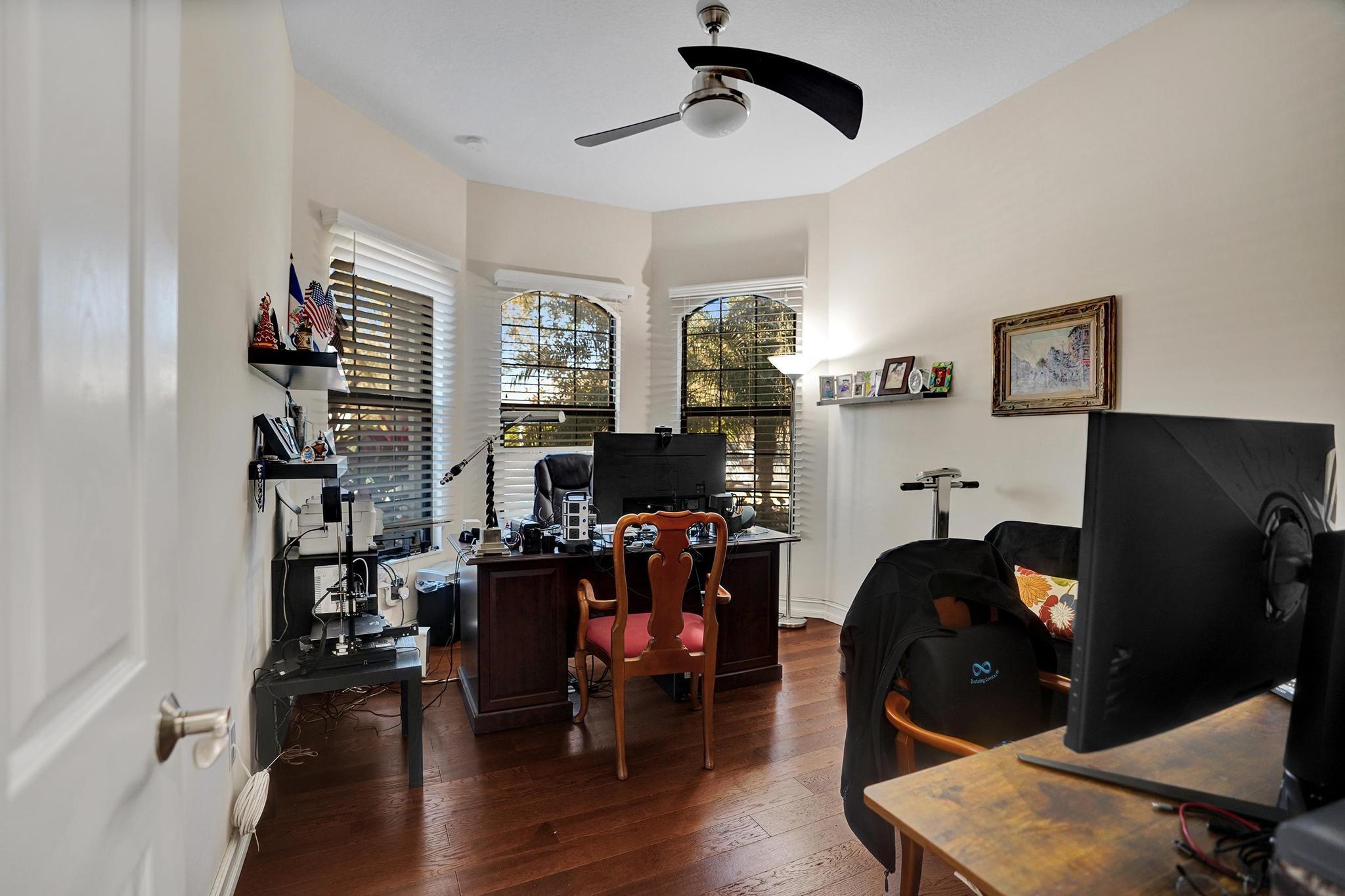 16610 Gateway Bridge Drive Delray Beach, FL 33446 - Photo 27 of 67 a living room with furniture and a flat screen tv