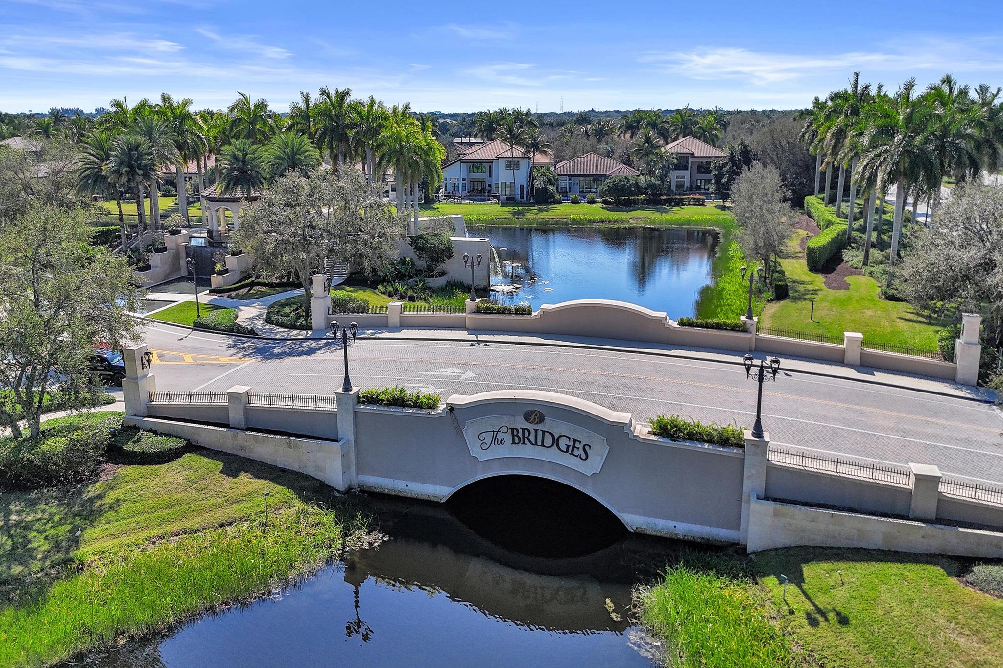 16610 Gateway Bridge Drive Delray Beach, FL 33446 - Photo 43 of 67 an outdoor view of the garden and swimming pool