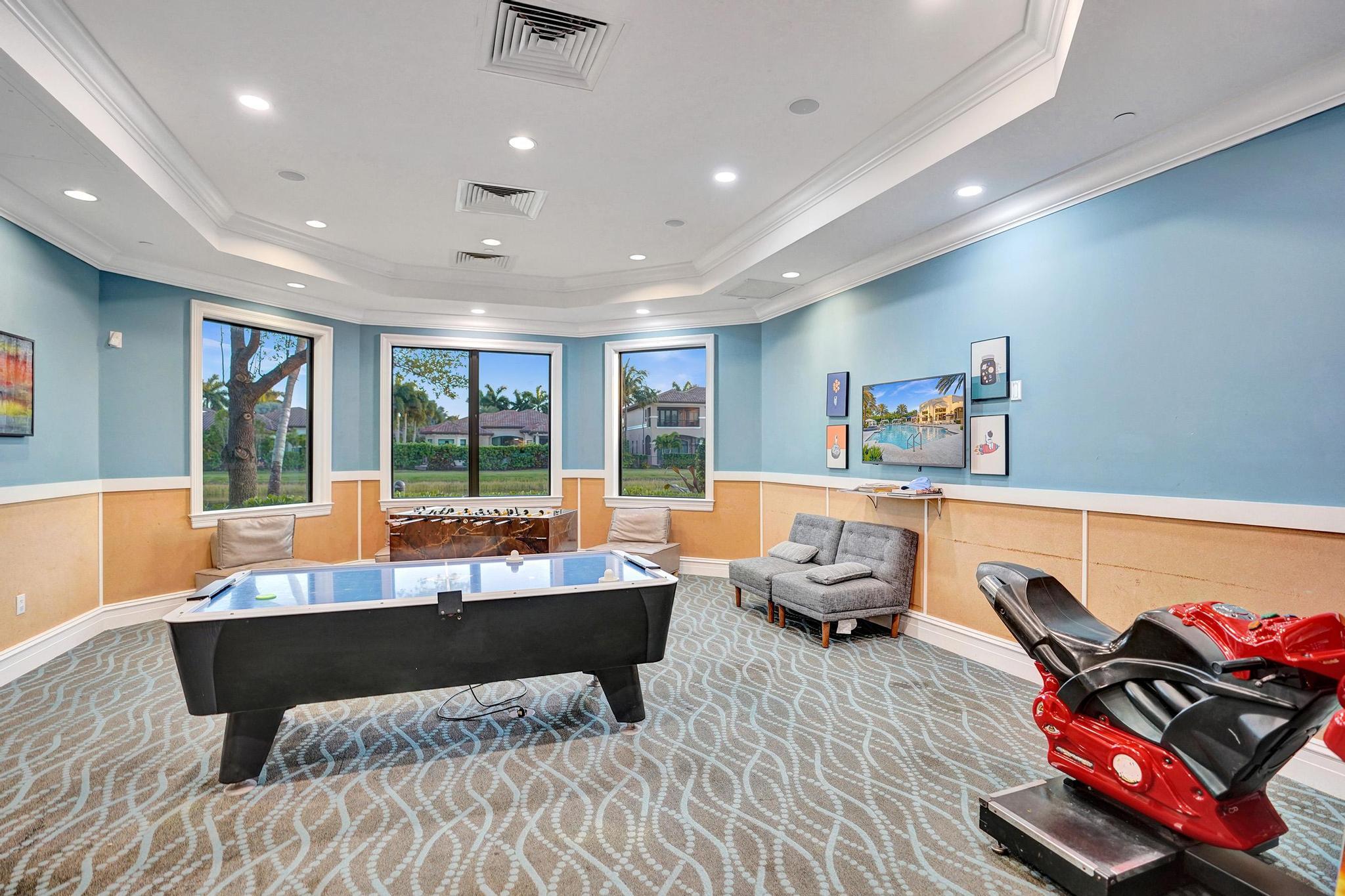 16610 Gateway Bridge Drive Delray Beach, FL 33446 - Photo 64 of 67 a living room with furniture and a large window