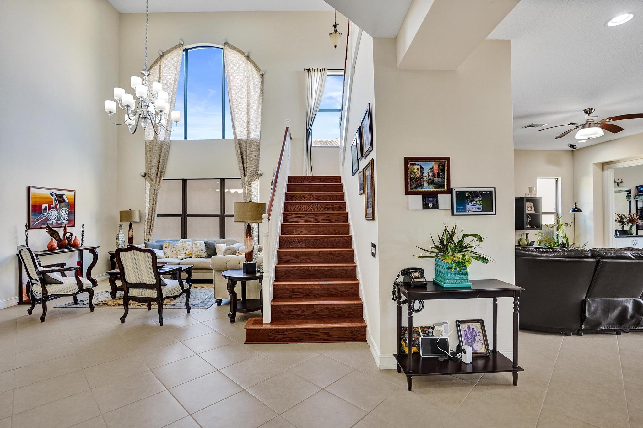 16610 Gateway Bridge Drive Delray Beach, FL 33446 - Photo 7 of 67 a dining room with furniture and wooden floor