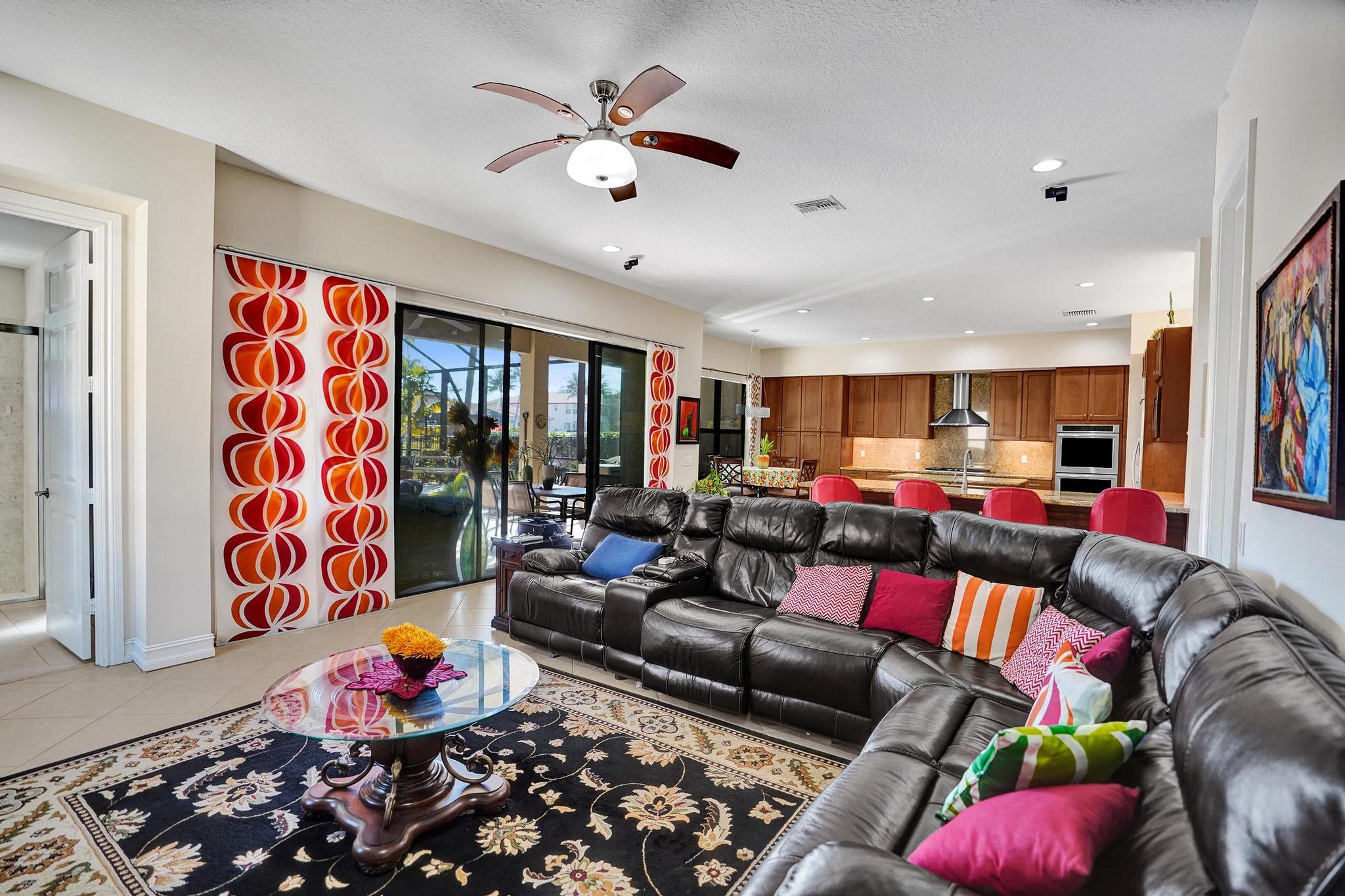 16610 Gateway Bridge Drive Delray Beach, FL 33446 - Photo 9 of 67 a living room with lots of furniture and wooden floor