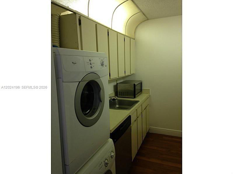8260 Southwest 210th Street, Unit 319 Cutler Bay, FL 33189 - Photo 13 of 20 a utility room with dryer and washer