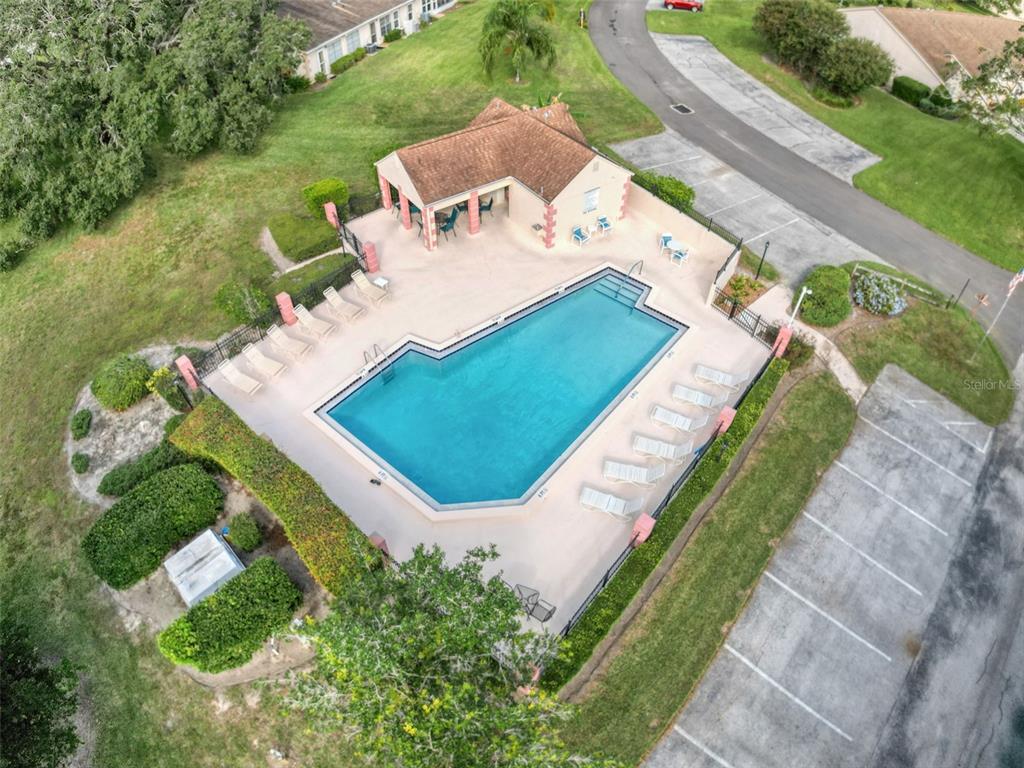 11403 Versailles Lane, Unit E Port Richey, FL 34668 - Photo 51 of 74 an aerial view of a house