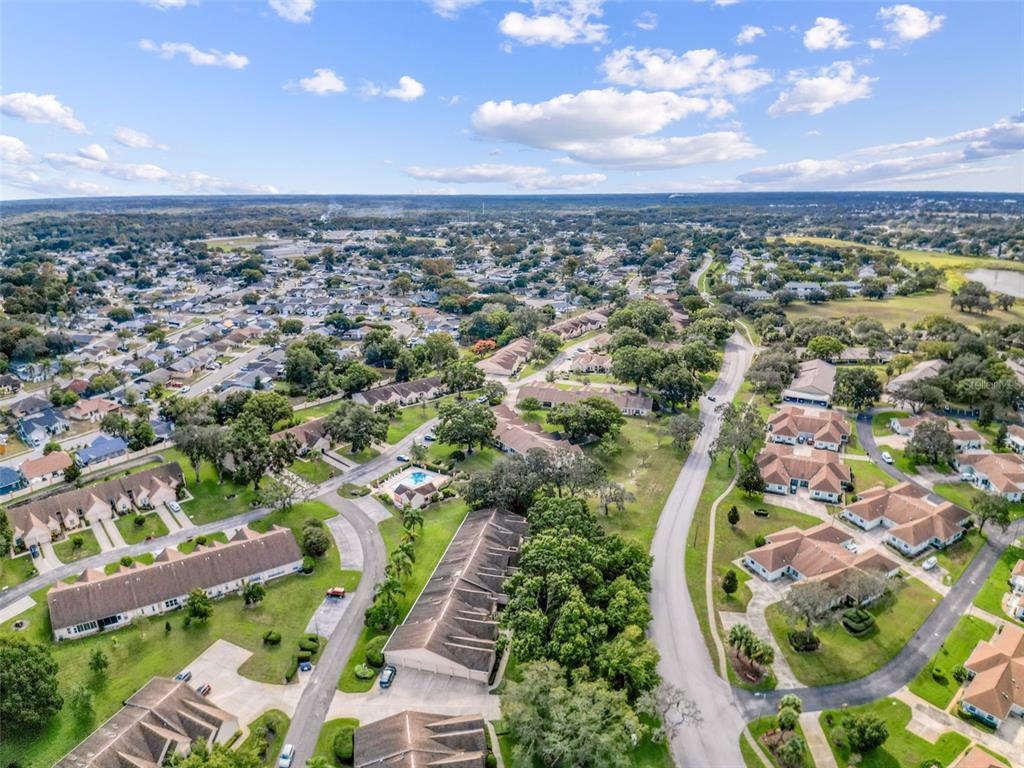 11403 Versailles Lane, Unit E Port Richey, FL 34668 - Photo 67 of 74 an aerial view of a city