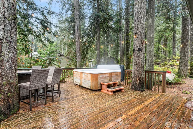 a view of a chairs and table on the wooden floor