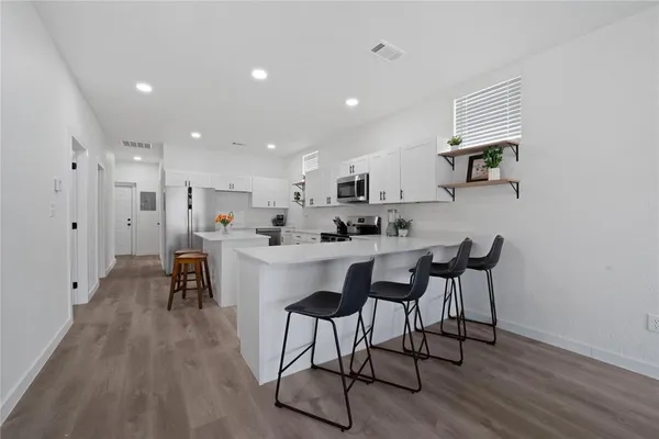 a living room with furniture and a couch