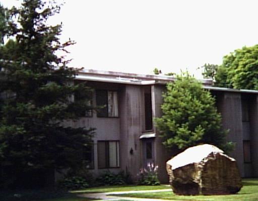 Olcott Way, Unit 32 Ridgefield, CT 06877 - Photo 1 of 1 a view of a house with a yard and plants