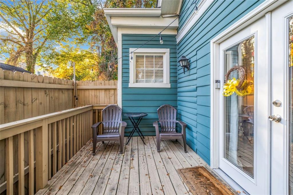 800 Myrtle Street Northeast Atlanta, GA 30308 - Photo 8 of 28 a view of balcony with two chairs and wooden floor