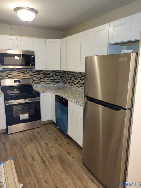 4605 Cogbill Road Richmond, VA 23234 - Photo 7 of 20 Kitchen featuring white shaker cabinetry, stainles