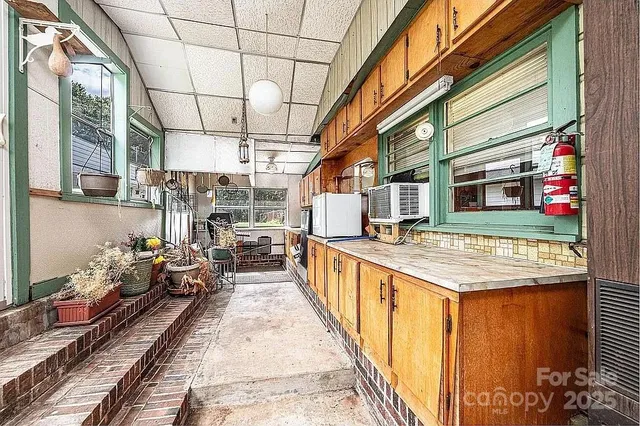 a bathroom with a toilet sink and shower