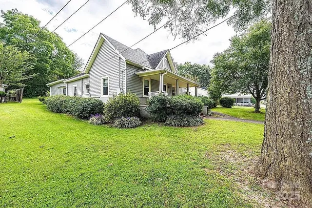 a view of a house with a garden