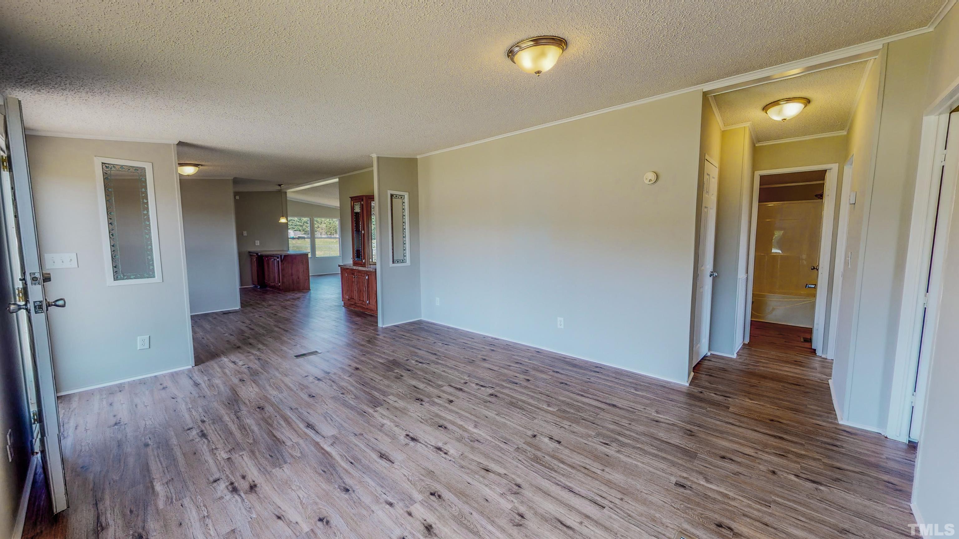 552 Huff Road Roxboro, NC 27574 - Photo 43 of 43 wooden floor in an empty room