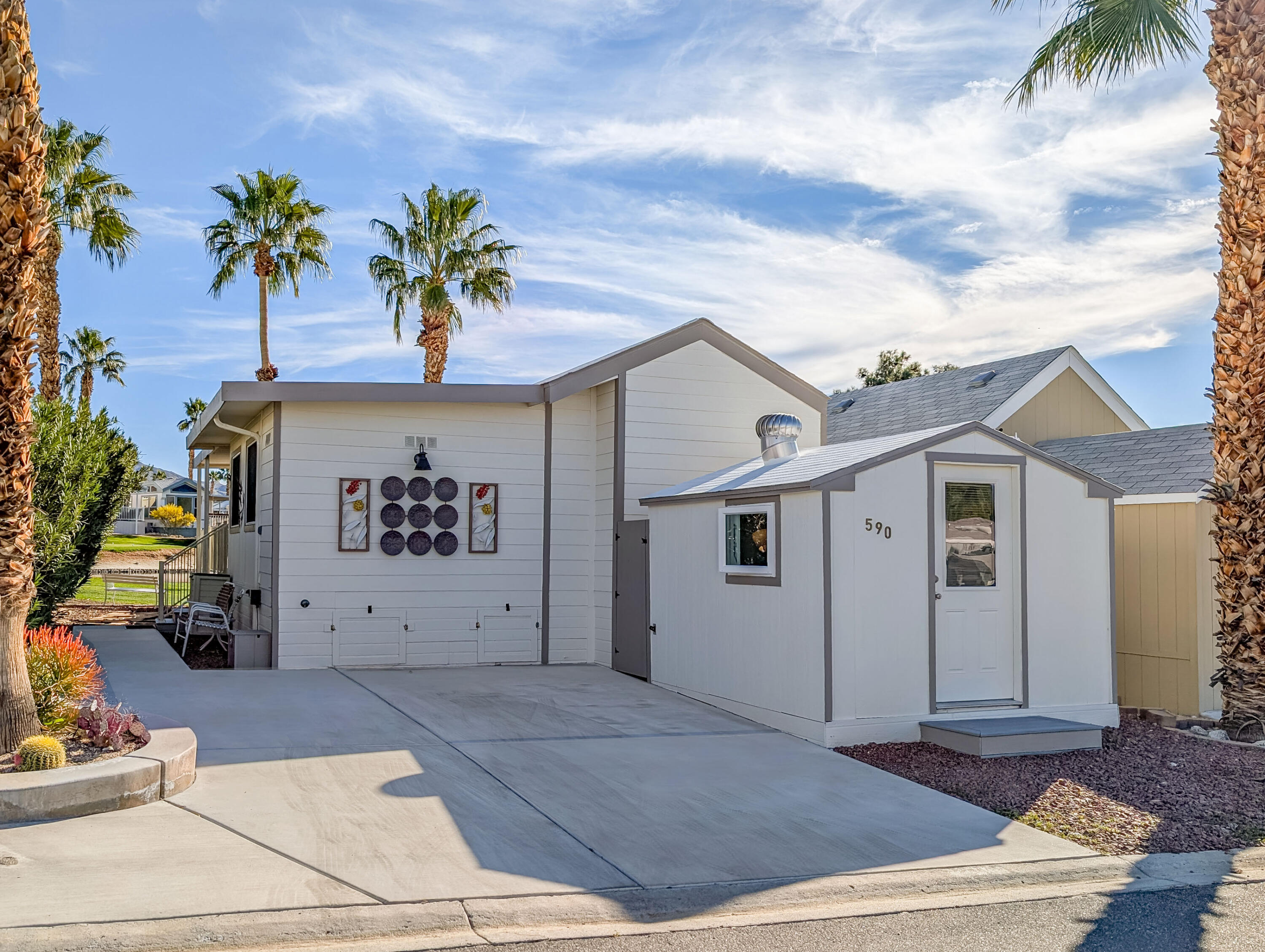 70200 Dillon Road, Unit 590 Desert Hot Springs, CA 92241 - Photo 1 of 42 a view of a garage