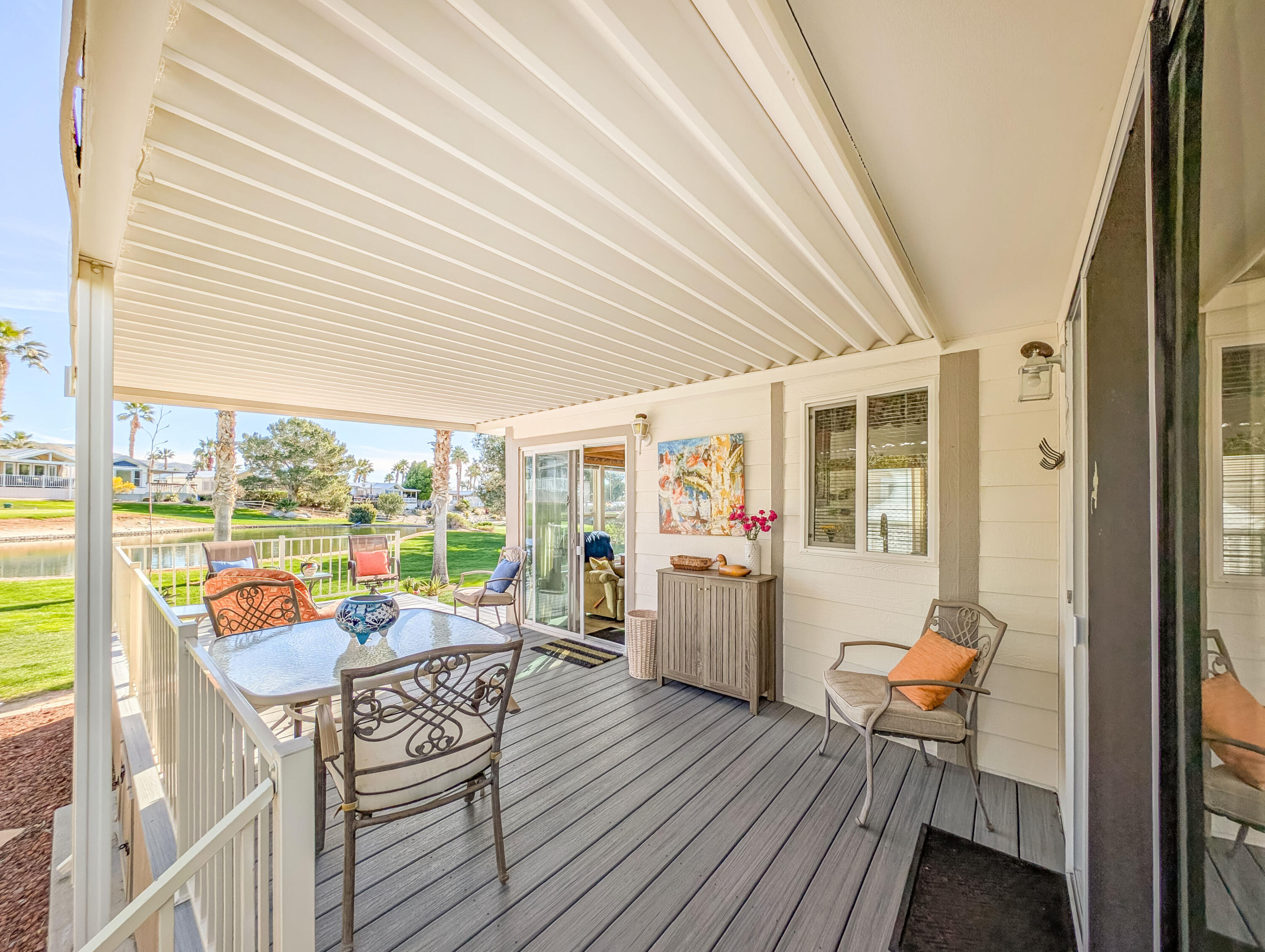 70200 Dillon Road, Unit 590 Desert Hot Springs, CA 92241 - Photo 11 of 42 a view of a dining room with furniture window and outside view