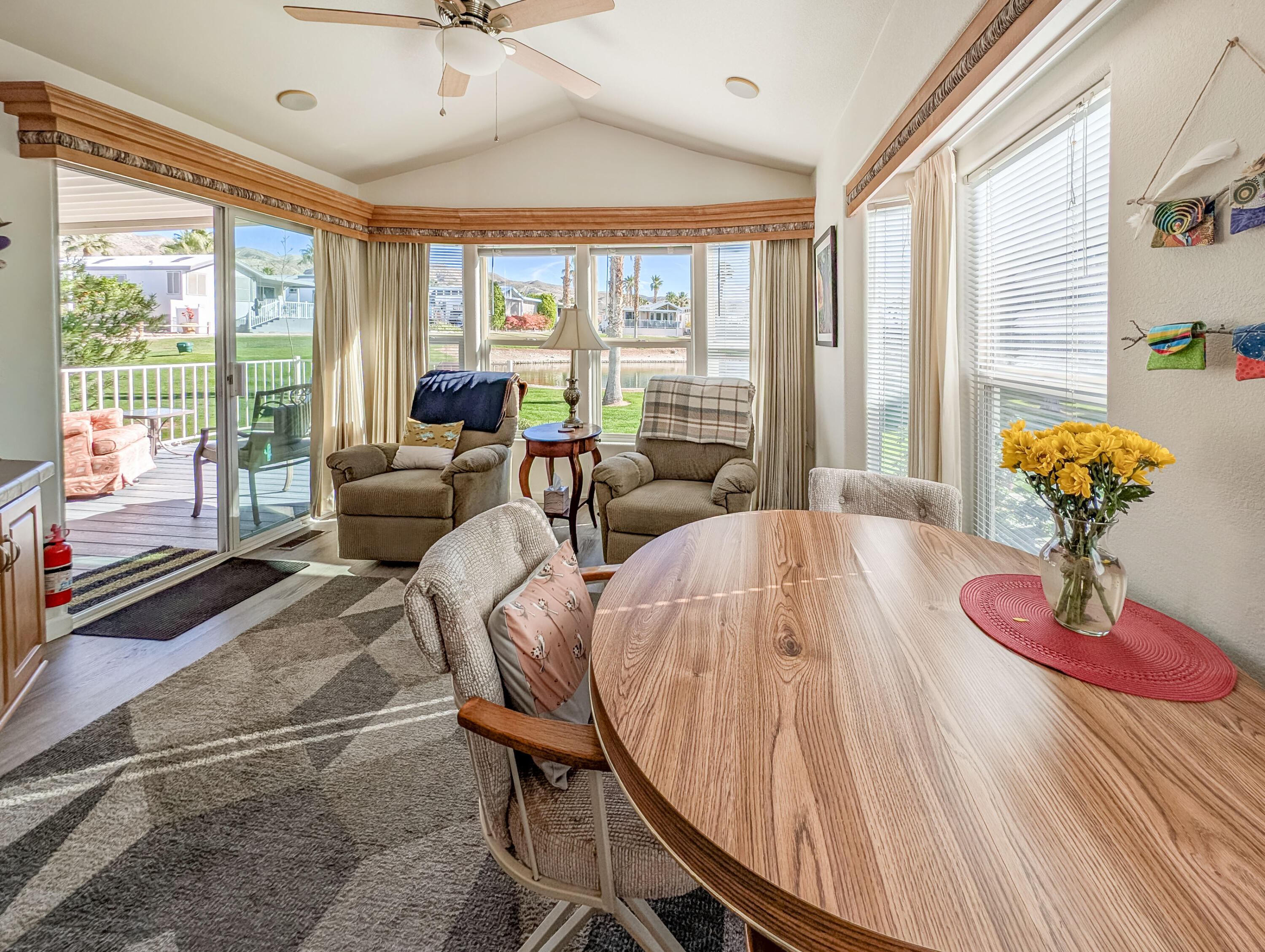 70200 Dillon Road, Unit 590 Desert Hot Springs, CA 92241 - Photo 28 of 42 a living room with furniture and a large window