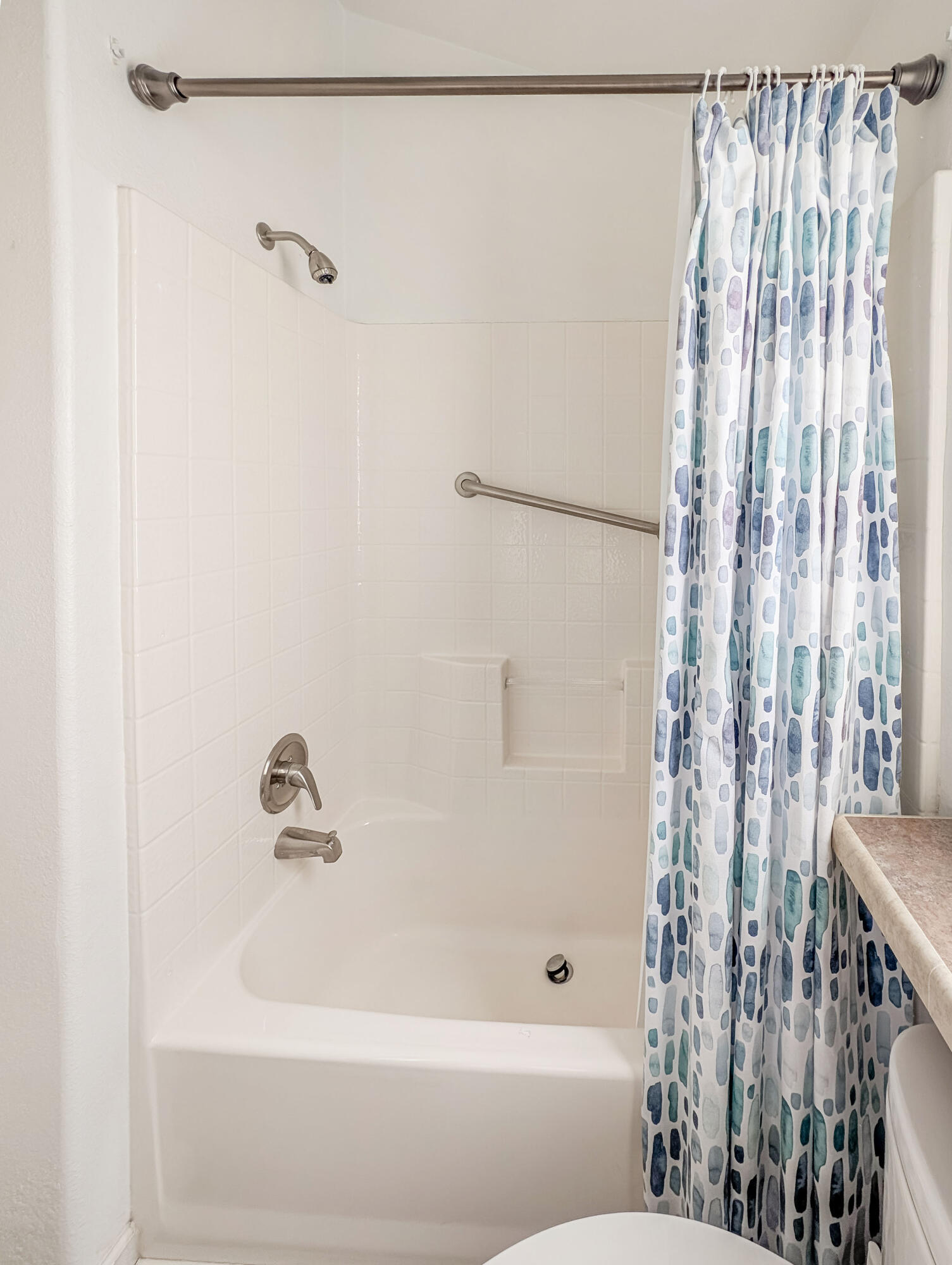 70200 Dillon Road, Unit 590 Desert Hot Springs, CA 92241 - Photo 30 of 42 a bathroom with a shower and a tub