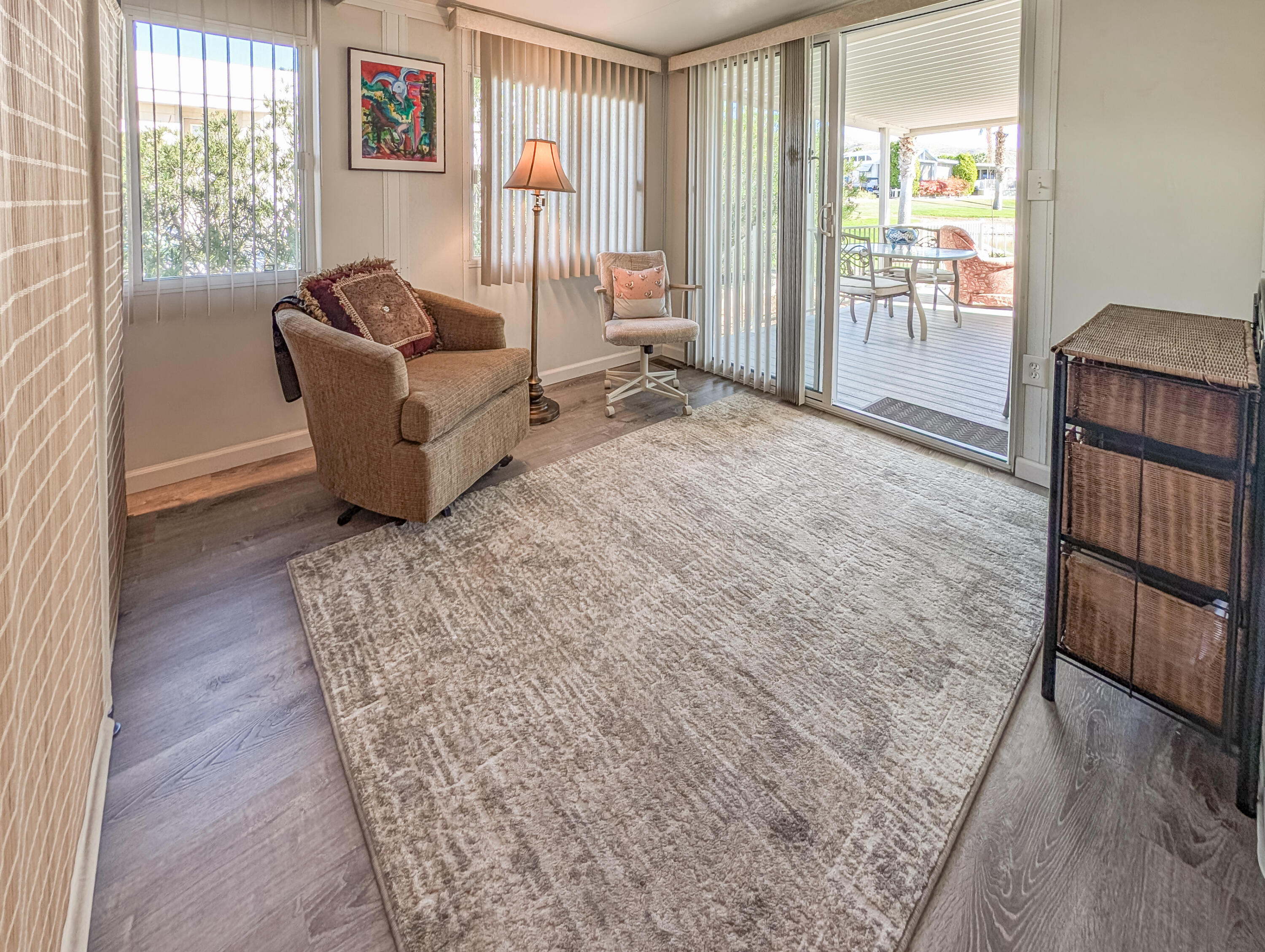 70200 Dillon Road, Unit 590 Desert Hot Springs, CA 92241 - Photo 40 of 42 a living room with furniture and a window