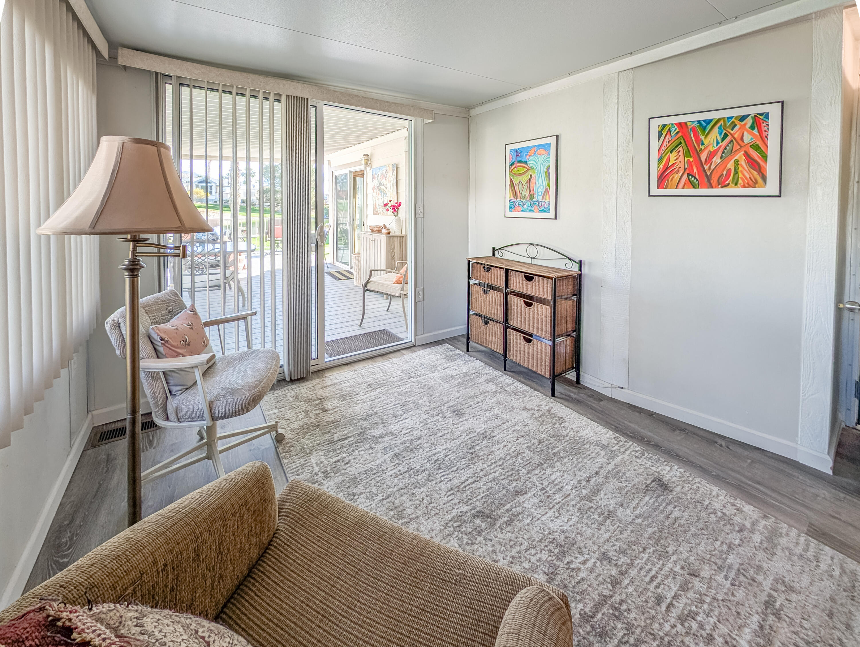 70200 Dillon Road, Unit 590 Desert Hot Springs, CA 92241 - Photo 41 of 42 a living room with furniture and a window