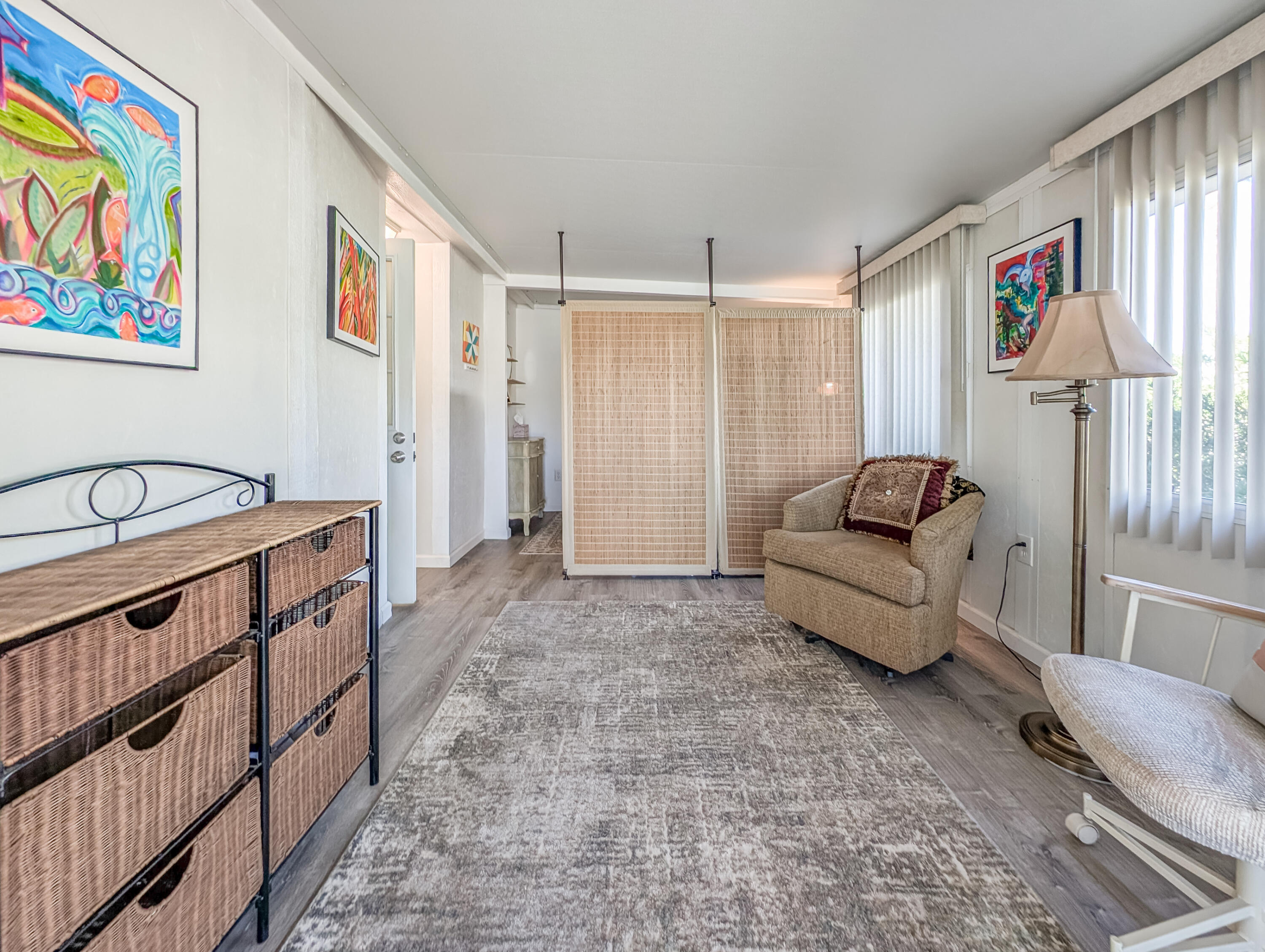 70200 Dillon Road, Unit 590 Desert Hot Springs, CA 92241 - Photo 42 of 42 a living room with furniture and a window