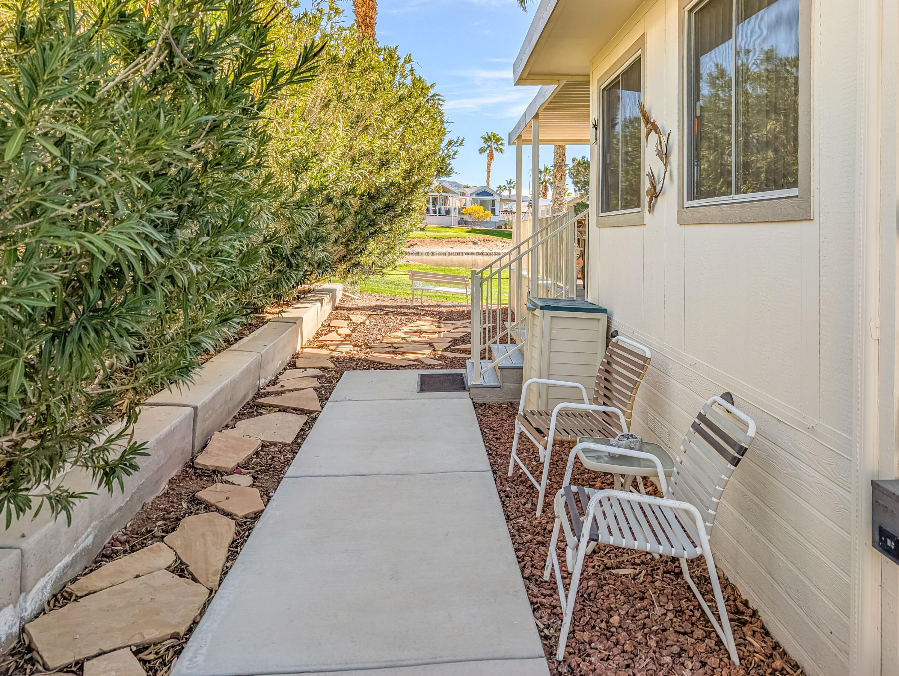 70200 Dillon Road, Unit 590 Desert Hot Springs, CA 92241 - Photo 9 of 42 a view of balcony with a potted plant