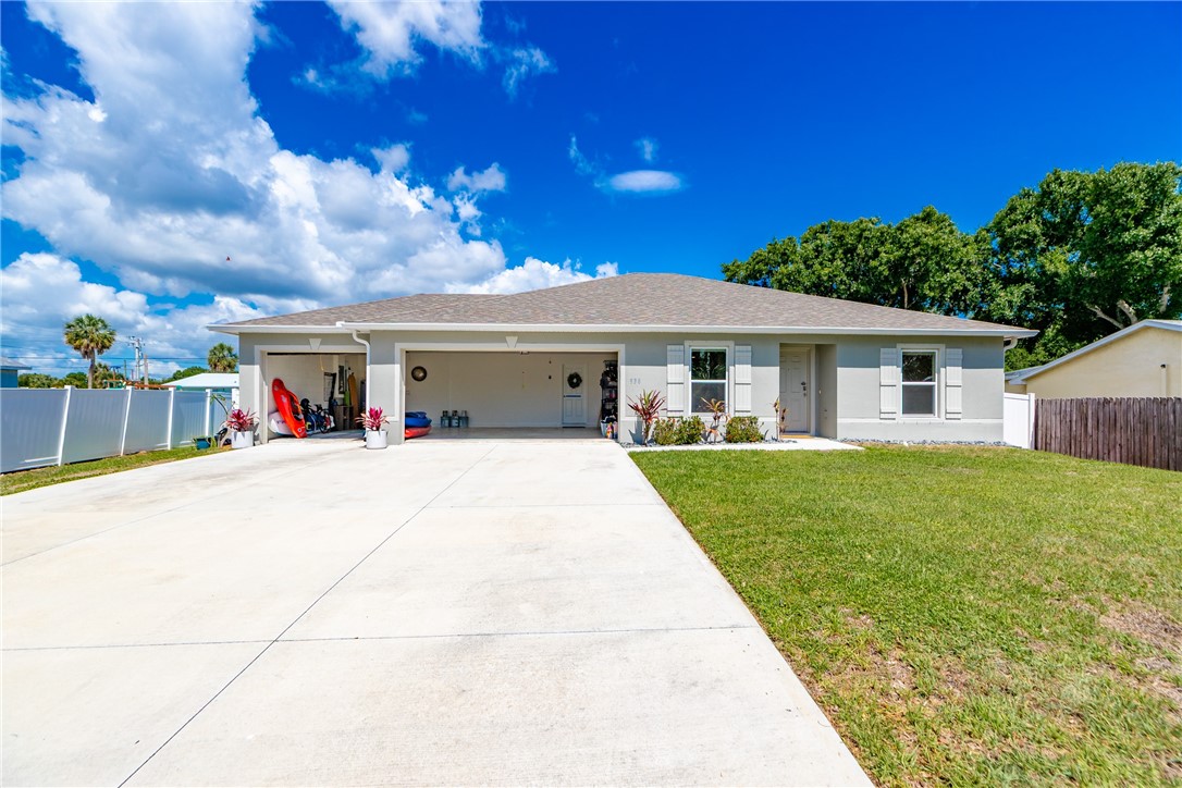 938 Clearmont Street Sebastian, FL 32958 - Photo 2 of 36 a view of house with outdoor space and swimming pool