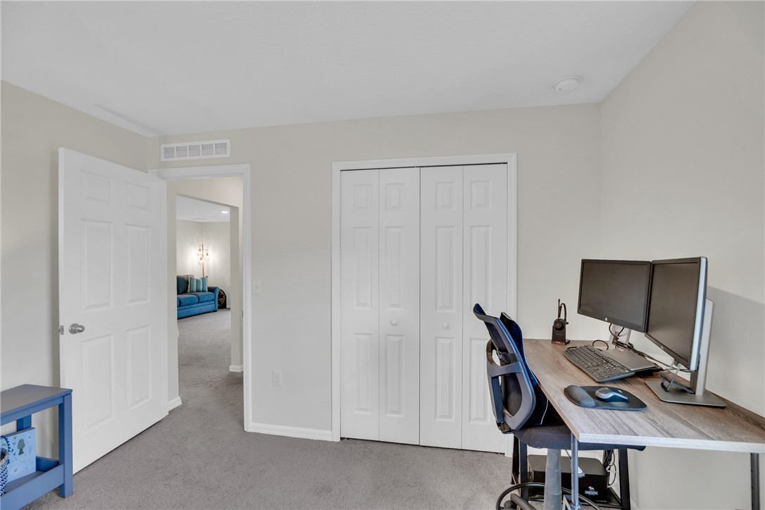 938 Clearmont Street Sebastian, FL 32958 - Photo 25 of 36 a view of a workspace with furniture and wooden floor