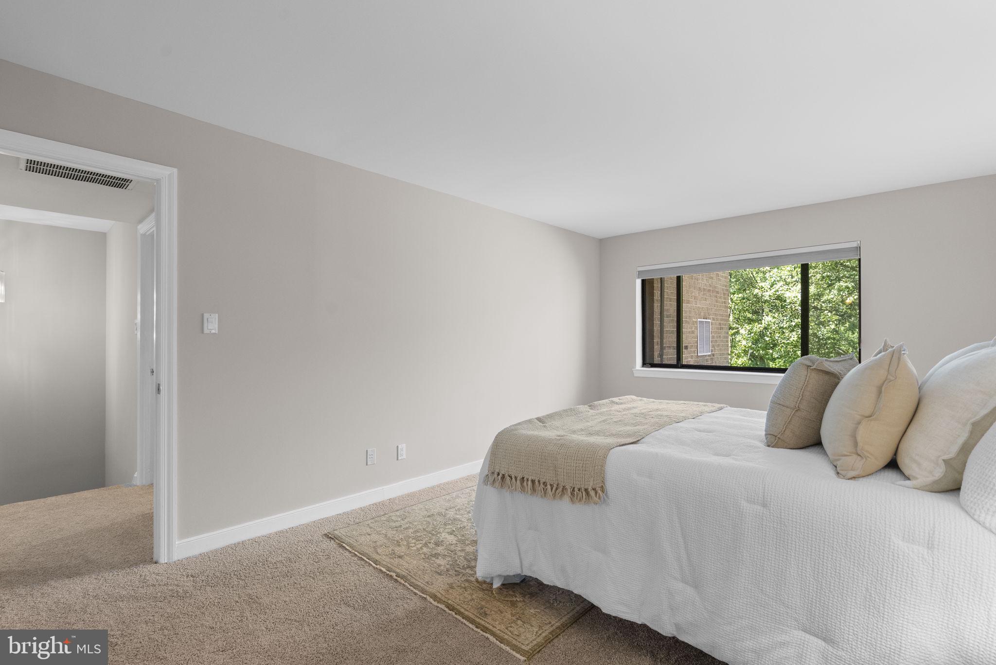 11420 Strand Drive, Unit R010 Rockville, MD 20852 - Photo 24 of 56 Primary Bedroom Suite