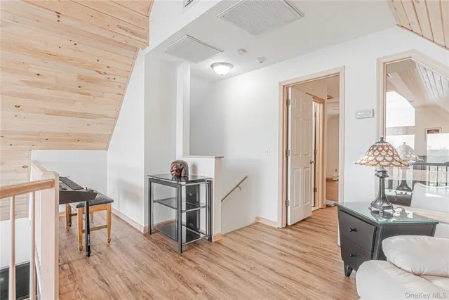 a livingroom with furniture and wooden floor