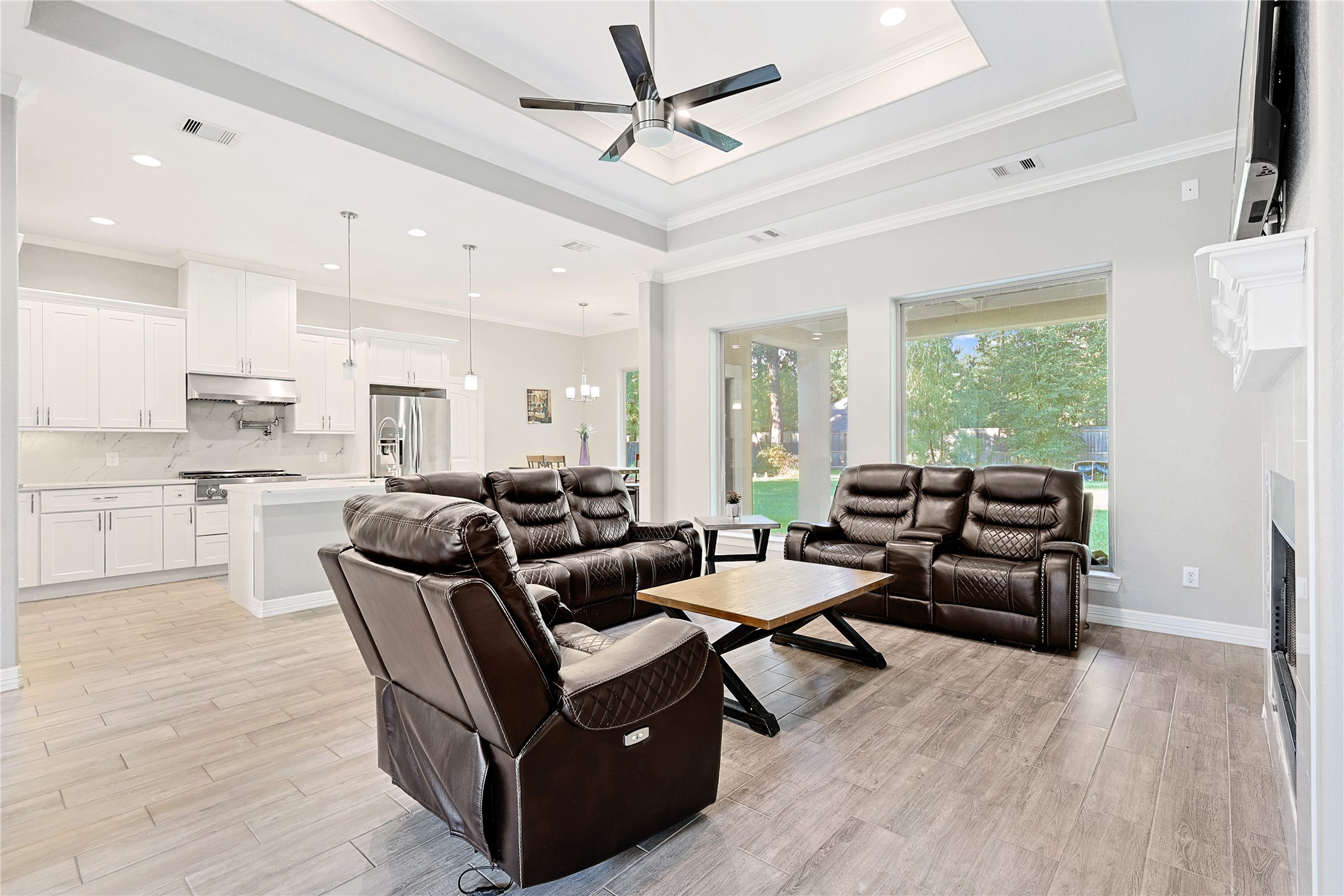 642 Parthenon Place New Caney, TX 77357 - Photo 5 of 30 a living room with furniture and a large window