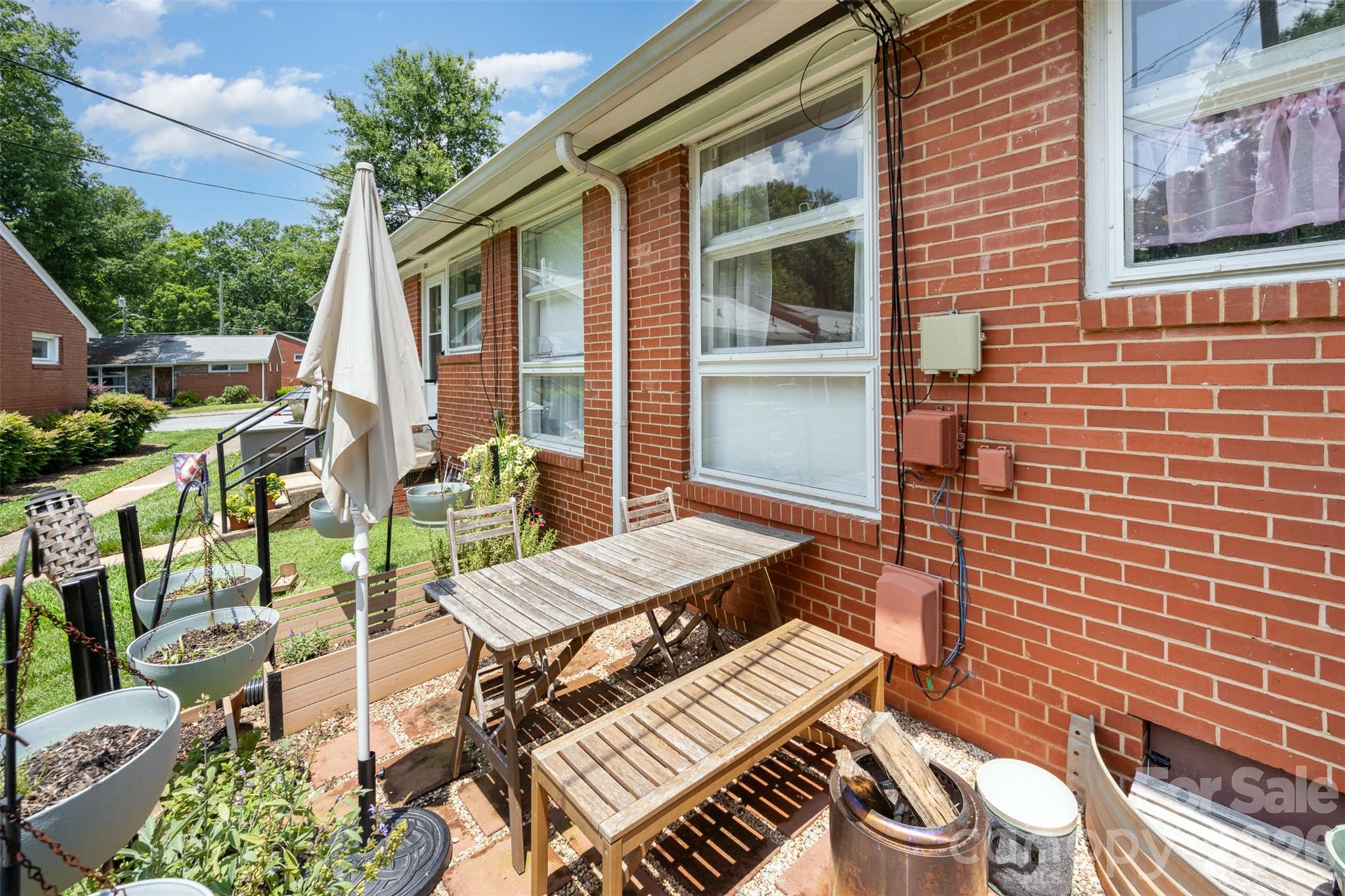 4232 Randolph Road Charlotte, NC 28211 - Photo 14 of 16 a view of a patio with chairs