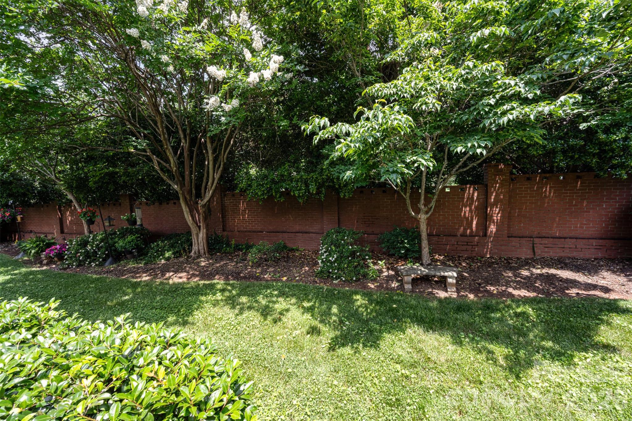 4232 Randolph Road Charlotte, NC 28211 - Photo 15 of 16 a backyard of a house with lots of green space