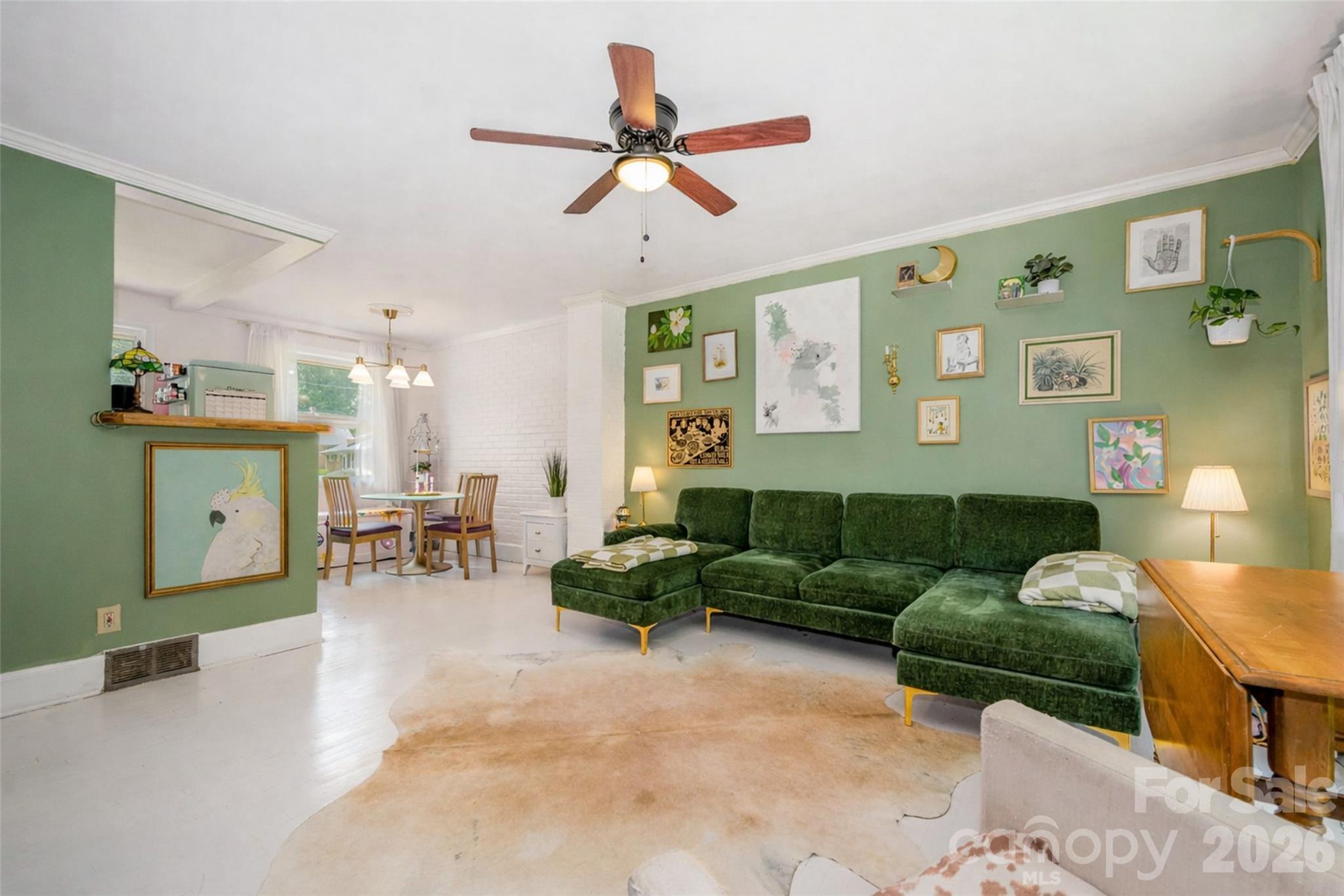 4232 Randolph Road Charlotte, NC 28211 - Photo 2 of 16 a living room with furniture and a couch