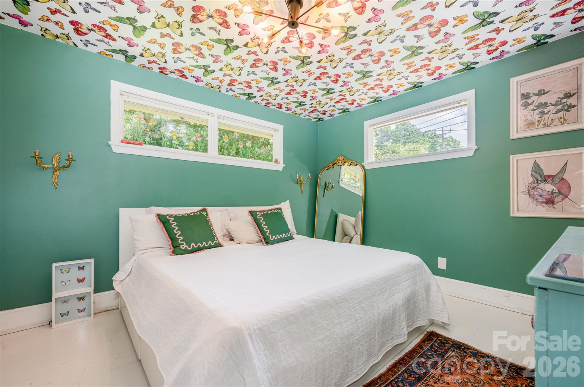 4232 Randolph Road Charlotte, NC 28211 - Photo 6 of 16 a bedroom with a bed and a painting on the wall