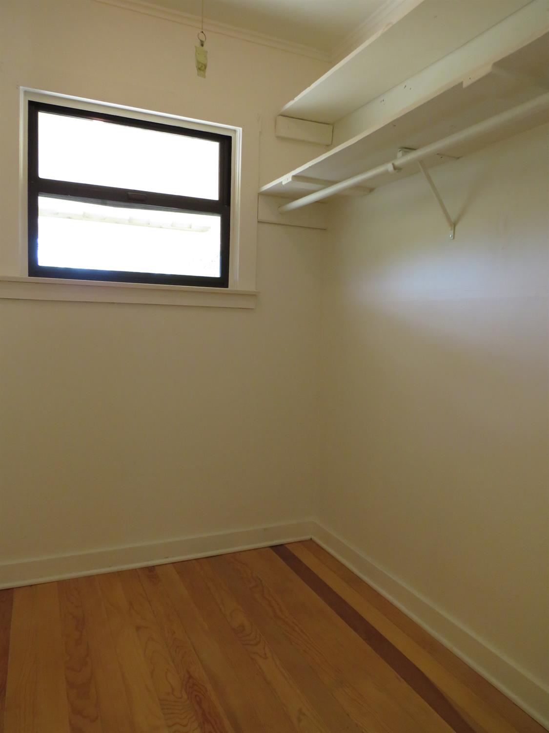 320 Pleasant Street Colfax, CA 95713 - Photo 24 of 49 a view of a small space with wooden floor and a window