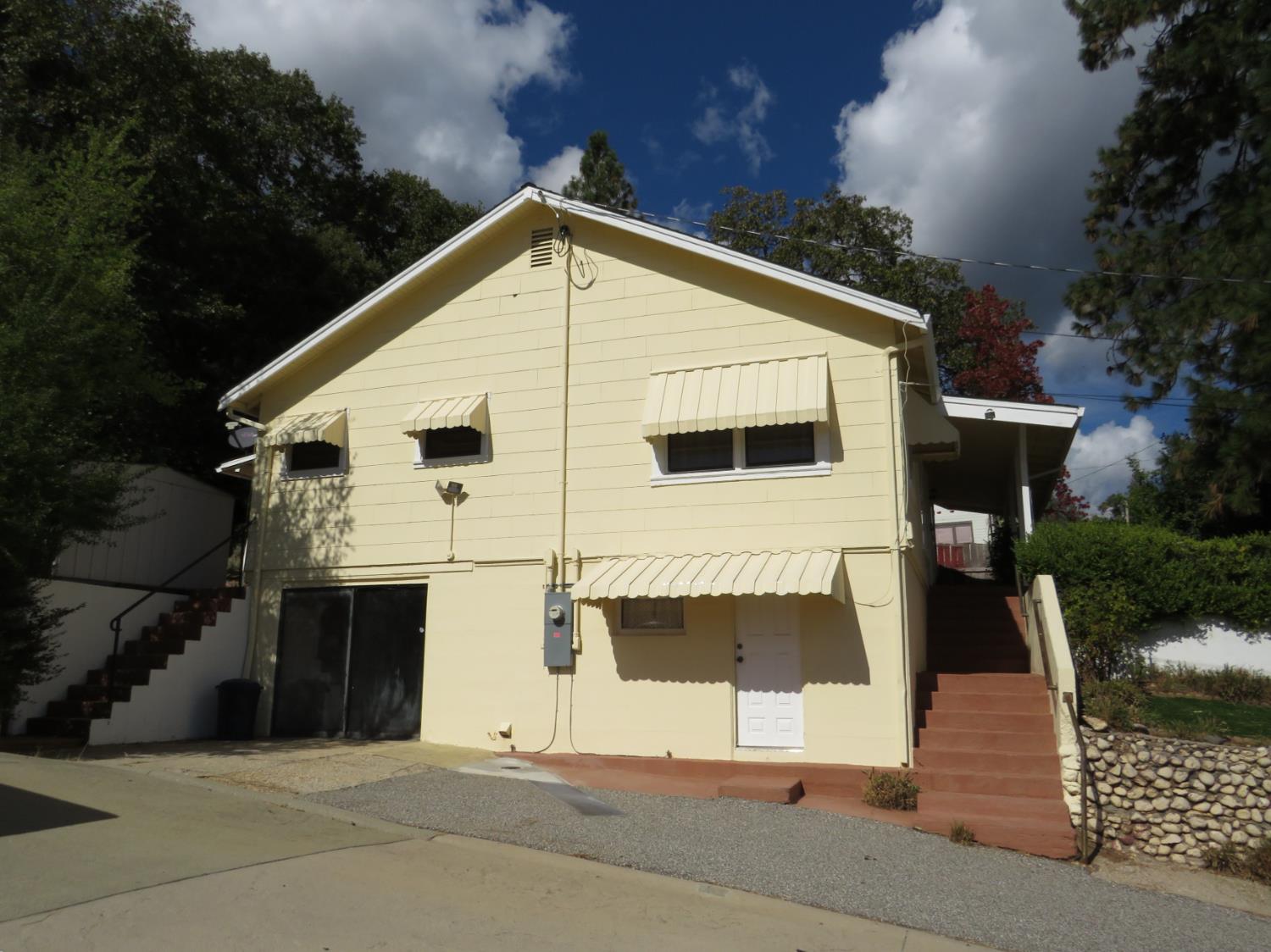 320 Pleasant Street Colfax, CA 95713 - Photo 39 of 49 a view of a white house with a yard